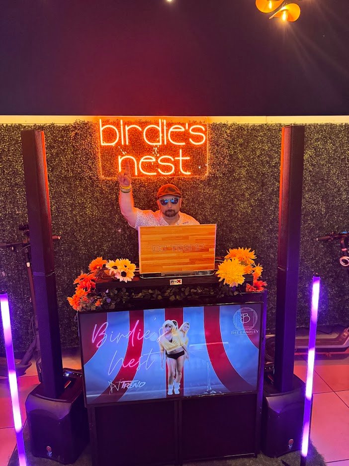 DJ TREND performing at Birdie's Nest at night